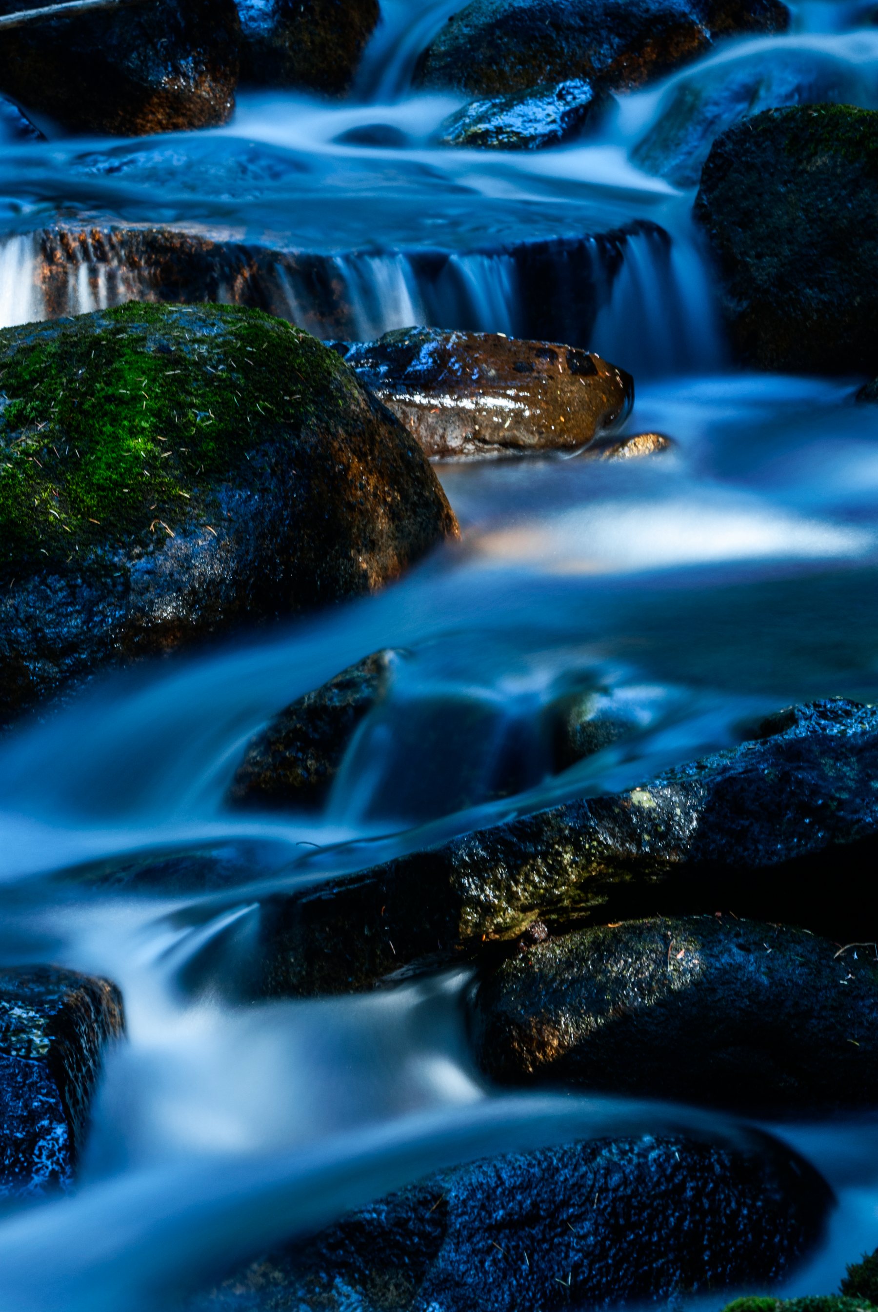 Clear water running over stone — the source of a V.S.O. service
